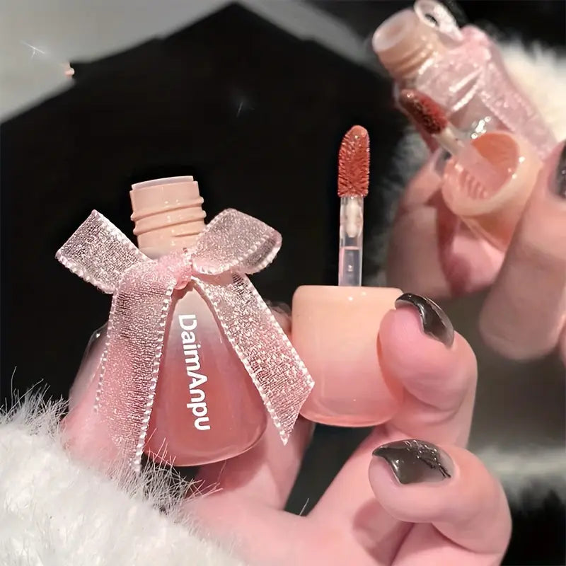 Mirror Water Lip Gloss – Nude, moisturizing, and long-lasting for a glossy, hydrated finish.