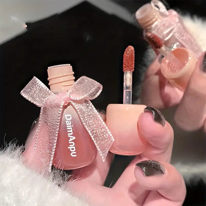 Mirror Water Lip Gloss – Nude, moisturizing, and long-lasting for a glossy, hydrated finish.