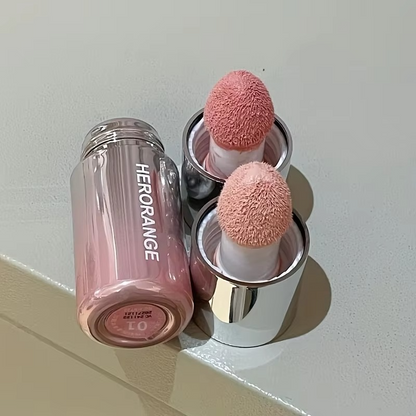 HERORANGE Liquid Blush Stick with Sponge Tip – Waterproof & Long-Lasting. Achieve a natural, brightening effect with medium coverage. The orange-pink tone suits all skin tones for a flawless K-beauty glow!